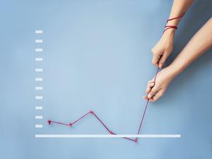 Conceptual business finance growth chart still life.