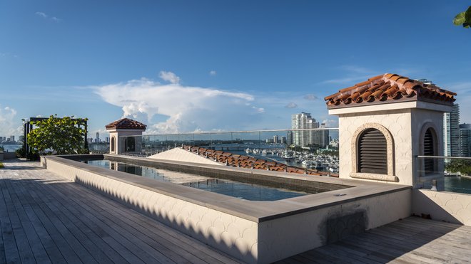 Palazzo Della Luna condo purchase on Fisher Island tied to Centric