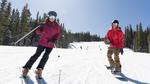 Skiers schuss down the slopes at Keystone Ski Resort on opening day, Oct. 12, 2019.