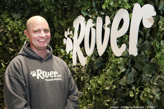 Rover CEO Aaron Easterly and his company's new headquarters in Seattle