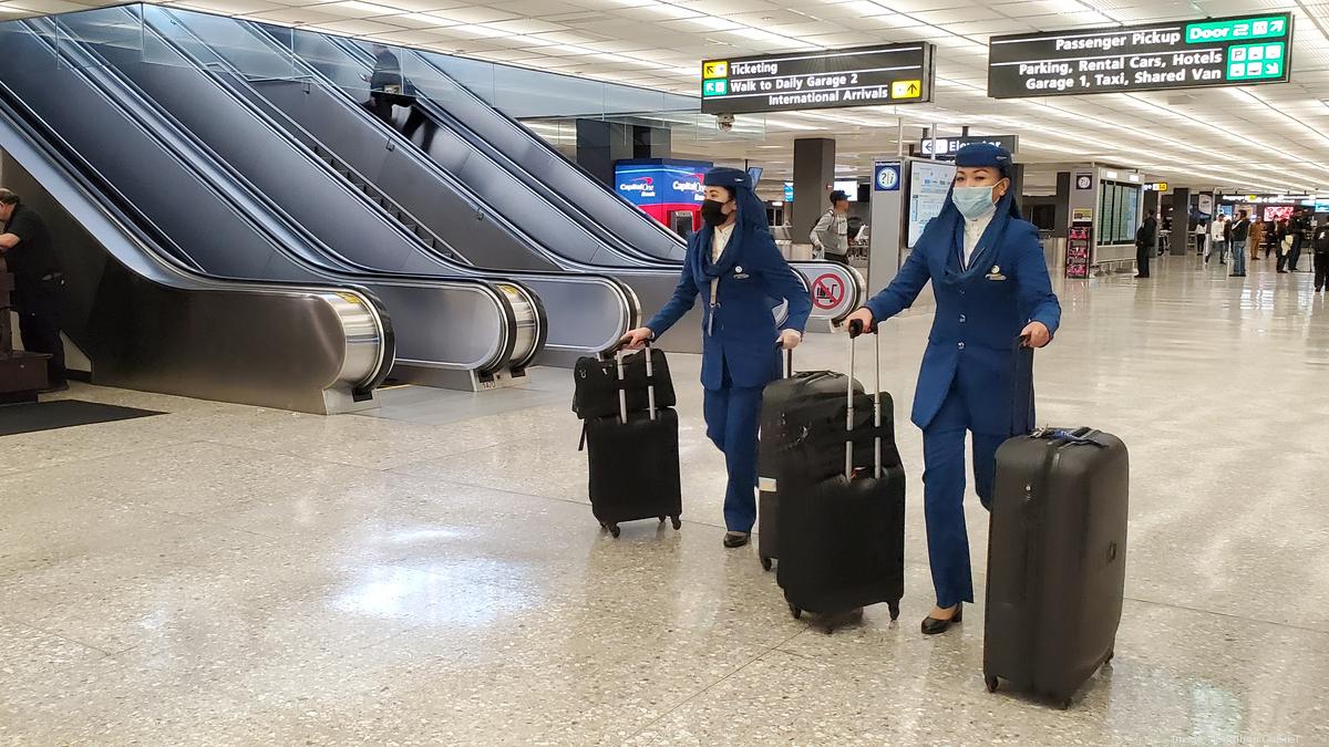 Dulles Airport's restaurant workers see their hours cut Washington