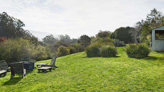 Chairs around fire pit at farmhouse