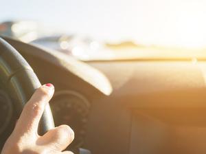 Woman driving her car