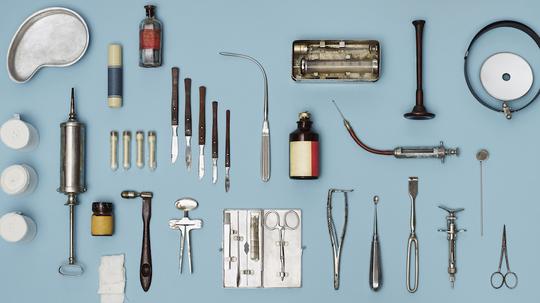 Directly above shot of medical tools on blue background