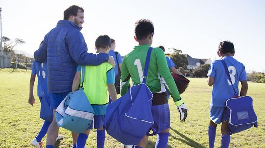 Boys soccer team preparing for a game