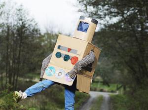 Boy dressed as robot outdoors