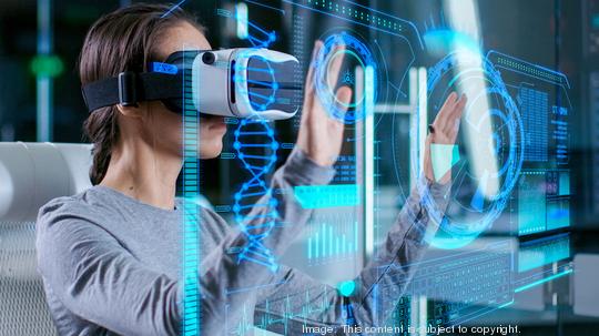 In Laboratory Scientist Wearing Virtual Reality Headset Sitting in a Chair Interacts with Futuristic Holografic Interface, Showing Neurological Data. Modern Brain Study/ Neurological Research Center.