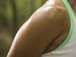 Woman stretching, close-up