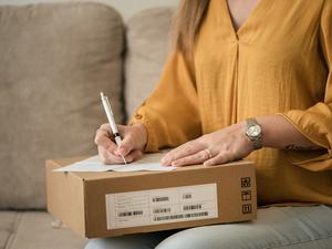 Close up of a woman receiving her package