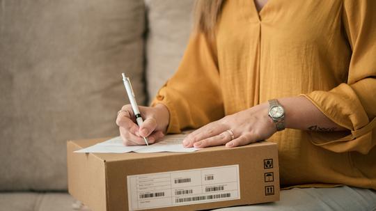 Close up of a woman receiving her package