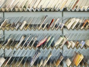 Racks of Brochures on Shelves