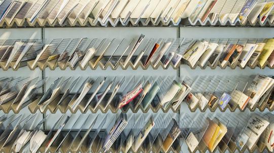 Racks of Brochures on Shelves