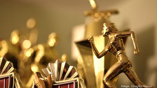 Trophy case with a collection of awards