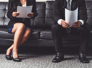 Stressed businessman and businesswoman candidate sit and wait for interview at the company office. Job application, business recruitment and Asian labor hiring concept.