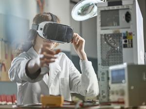 female engineer using virtual reality headset