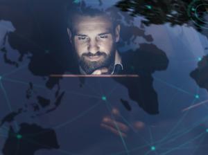 Businessman with tablet in car at night surrounded by data