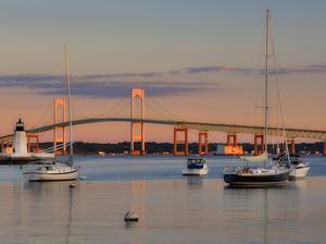 Goat Island lighthouse and the Jamestown at sunrise, Newport, RI, Rhode Island