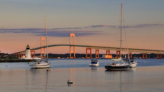 Goat Island lighthouse and the Jamestown at sunrise, Newport, RI, Rhode Island