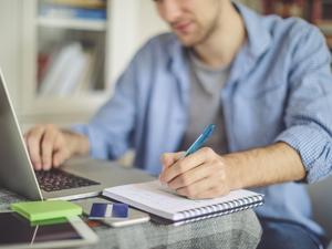 Young man working at home