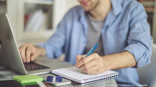 Young man working at home