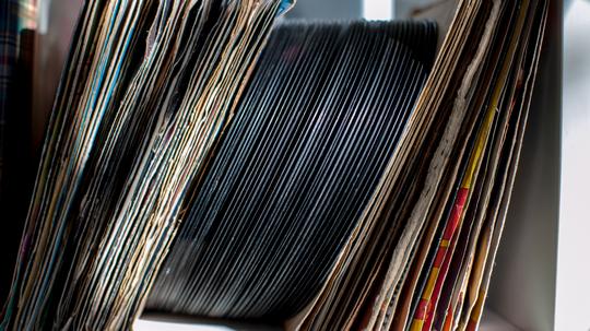 Close-Up Of Vinyl Records In Shelf