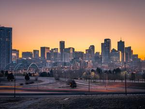 Silhouette Modern Buildings Against Sky During Sunset