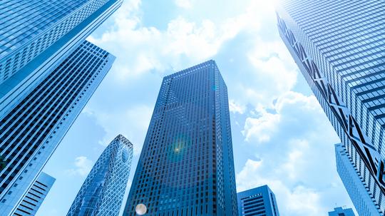 Low Angle View Of Modern Buildings Against Sky