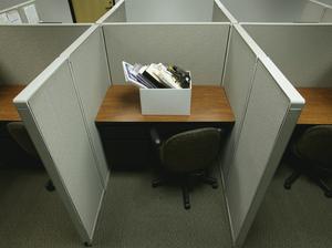 Cubicle with Box of Personal Belongings