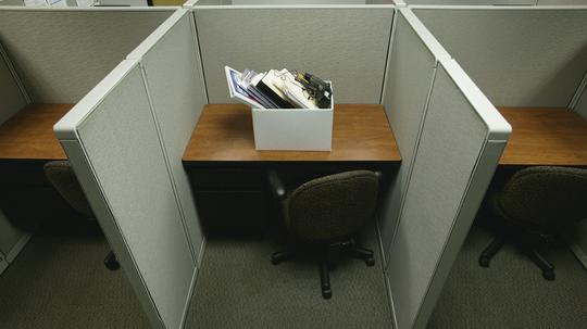 Cubicle with Box of Personal Belongings