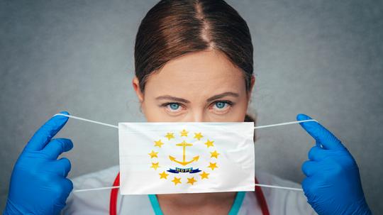 Coronavirus in U.S. State Rhode Island, Female Doctor Portrait, protect Face surgical medical mask with Rhode Island Flag. Illness, Virus Covid-19 in Rhode Island