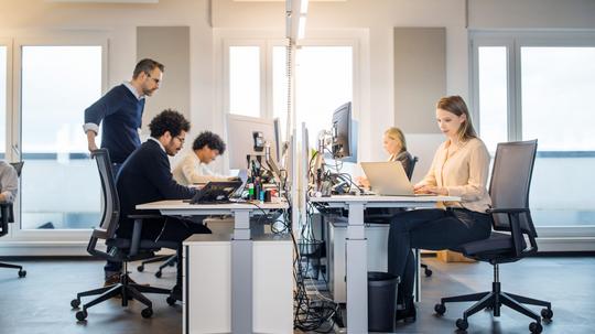 Business people working in a small office