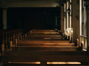 brown-wooden-church-bench-near-white-painted-wall-133699