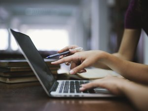 Two young women working and used computer, working concept.