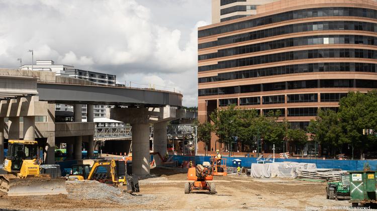 Construction workers at Silver Spring Purple Line station in August 2020. Work is expected to begin early next year on the line after a new general contractor and other builders come on board.