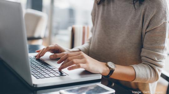 Woman using her laptop