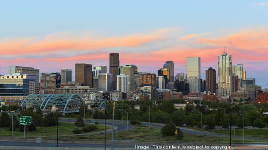 USA, Colorado, Denver, Cityscape with Interstate Highway at sunet