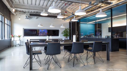 Tables in open office dining area