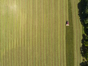 Drone Aerial of Tractor Cutting Hay