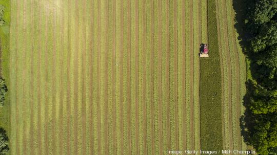 Drone Aerial of Tractor Cutting Hay