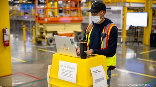 Masked Amazon worker