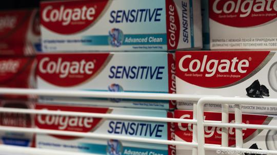 Colgate Toothpaste Boxes seen displayed in a supermarket