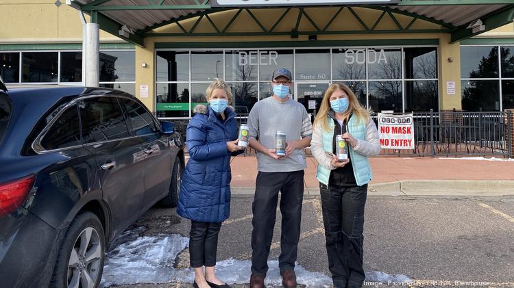 Old 121 Co Founder Brett Zahrte (center) with two hospital workers