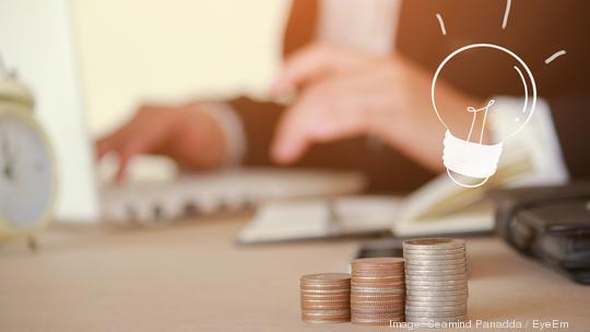 Close-Up Of Businesswoman Working At Table