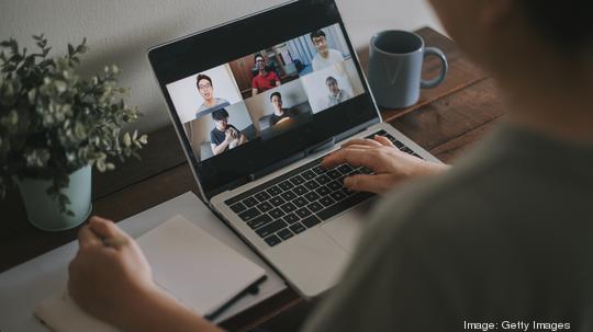 an asian chhinese mid adult woman at Home Office Video Conference with casual clothing using laptop