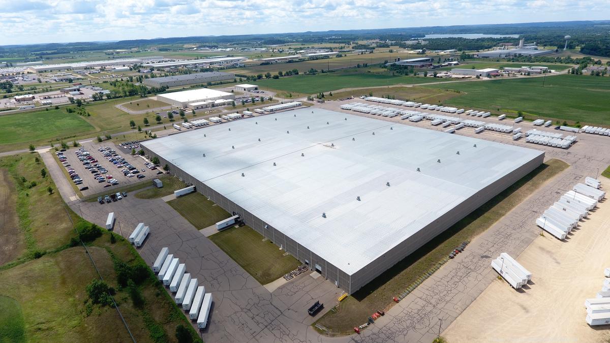 FedEx center near Milwaukee airport among six buildings trading in big