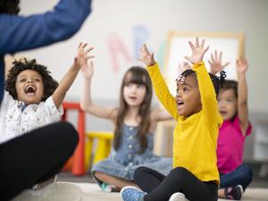 Multi-ethnic group of preschool students in class