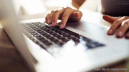 Young woman working at home