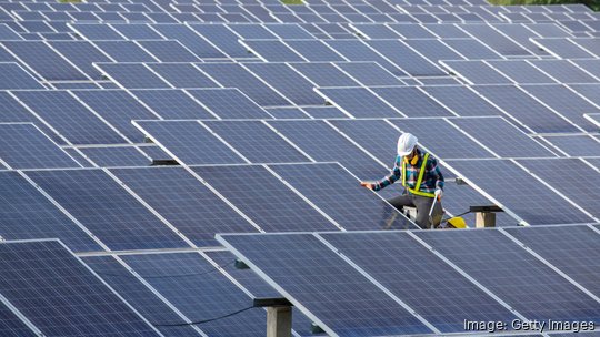 Getty Images, engineer working on checking equipment in solar power plant, Pure energy, Renewable energy