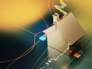 House Symbol Sitting over A Bar Graph - Stock Market and Real Estate Concept