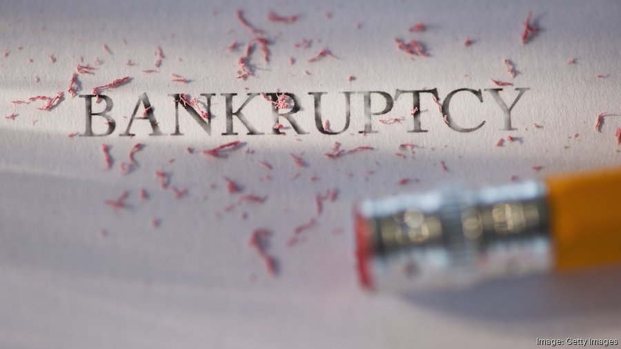Getty Images, Studio shot of pencil erasing the word bankruptcy from piece of paper